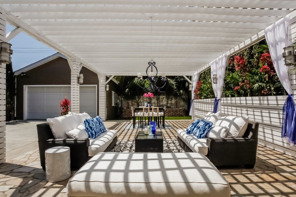 This is an example of a traditional backyard patio in Charlotte with a pergola.