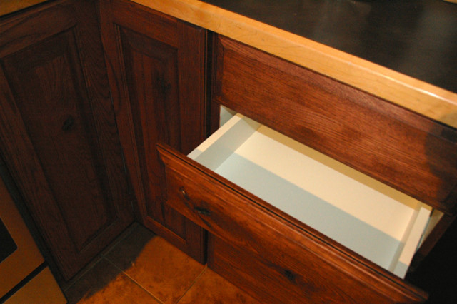 Kitchen - small rustic kitchen idea in Denver