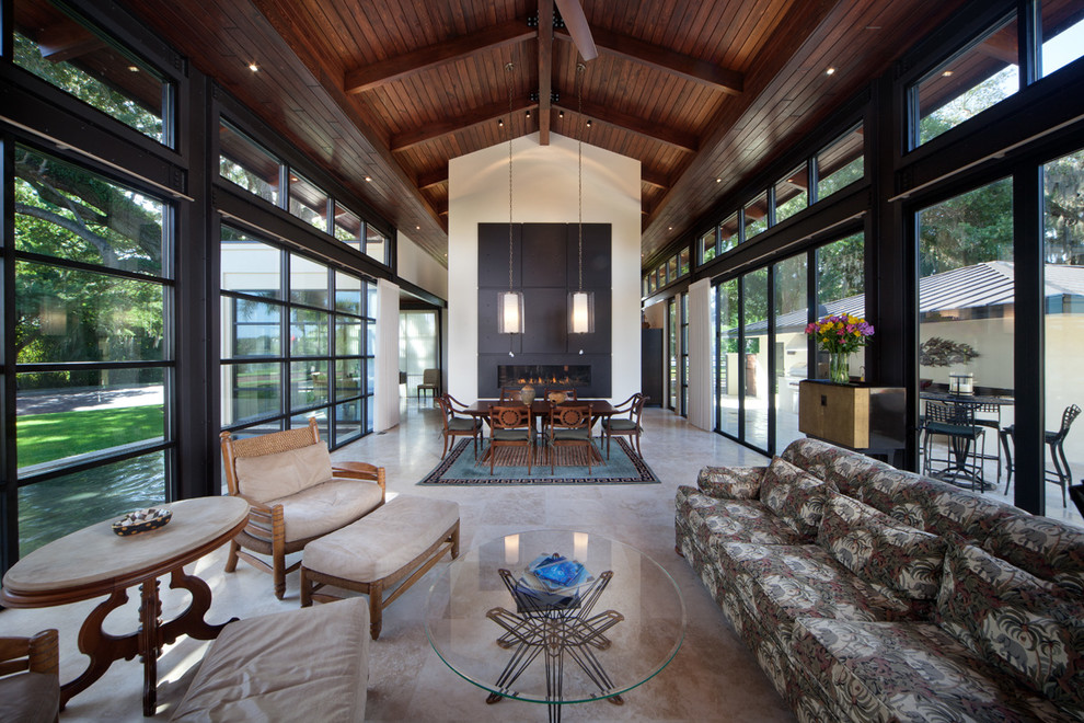 Design ideas for a contemporary open concept living room in Orlando with grey floor.