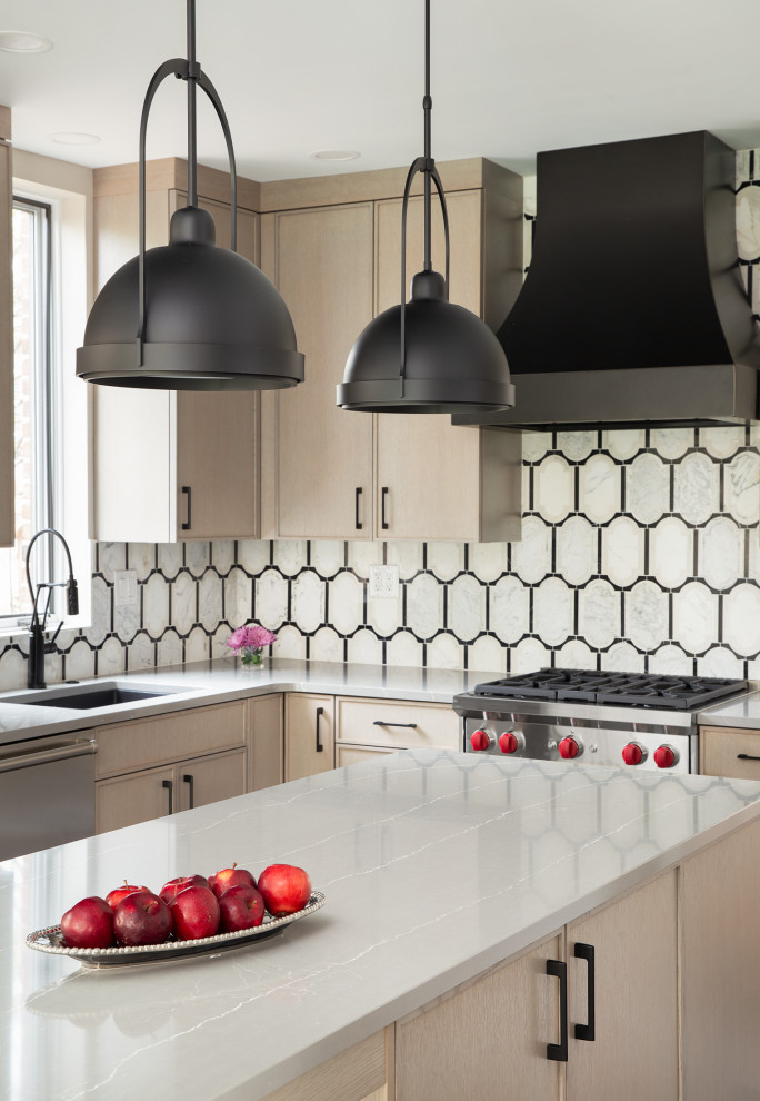 Inspiration for a transitional kitchen remodel with an island