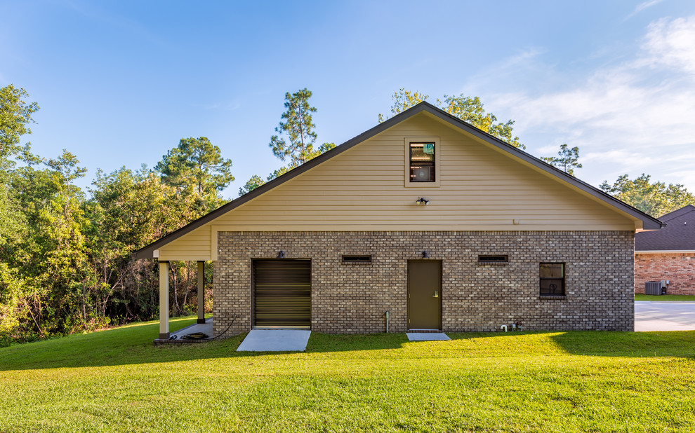 Huge transitional detached three-car home design photo