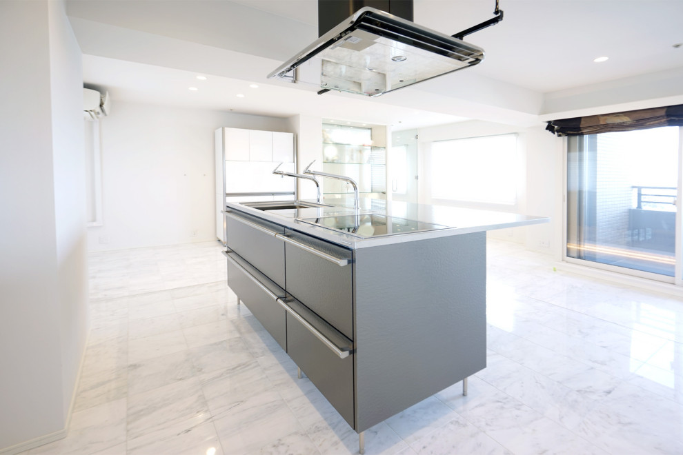 Inspiration for a large modern open plan kitchen in Other with marble floors, with island, wallpaper, a single-bowl sink, grey cabinets, white floor and grey benchtop.