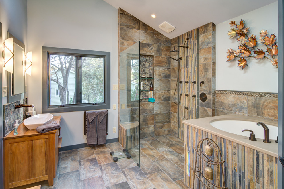 This is an example of a large transitional master bathroom in Atlanta with beaded inset cabinets, light wood cabinets, a japanese tub, an open shower and white walls.