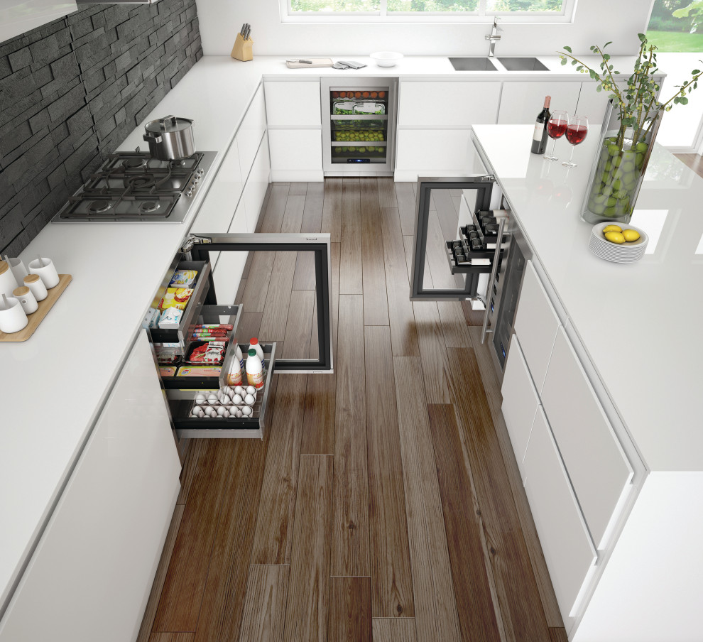 Example of a transitional kitchen design in Milwaukee with white cabinets and stainless steel appliances