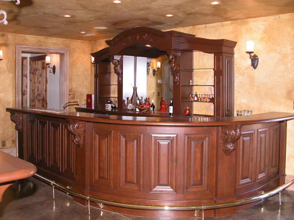 Large traditional home bar in Other.