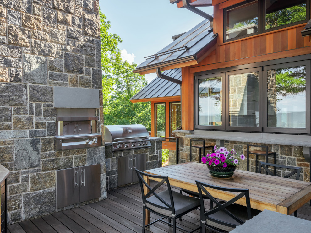 Rustic terrace in New York with a bbq area.
