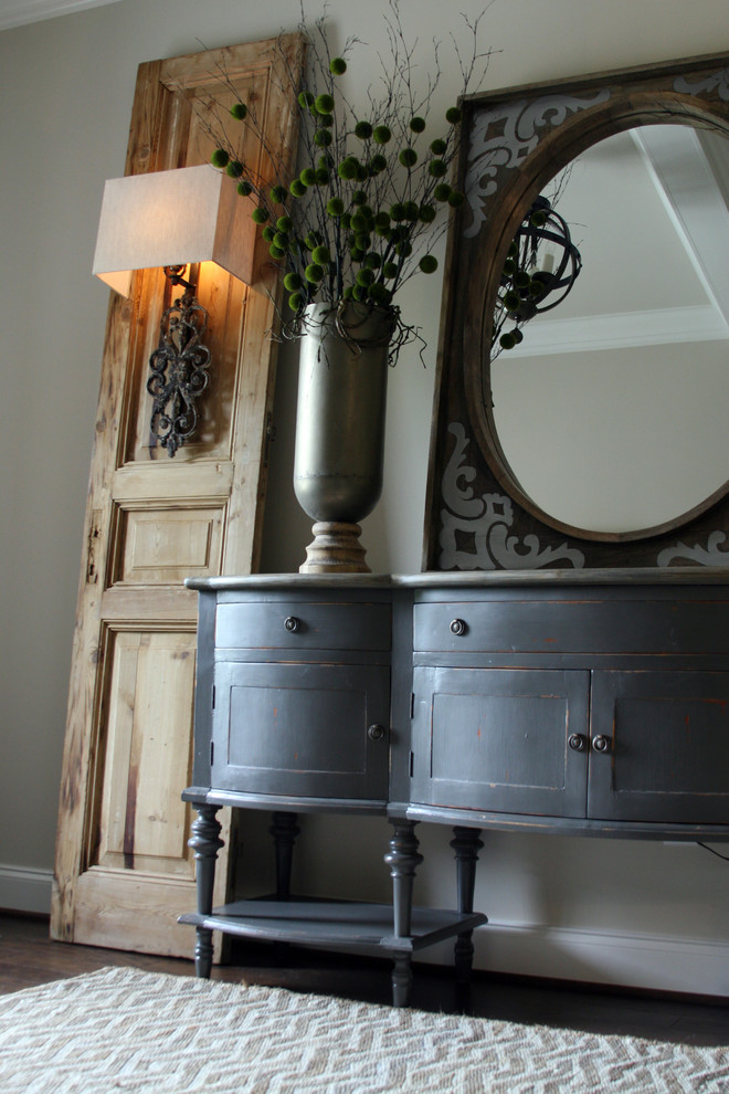 Inspiration for a mid-sized traditional foyer in Birmingham with beige walls.