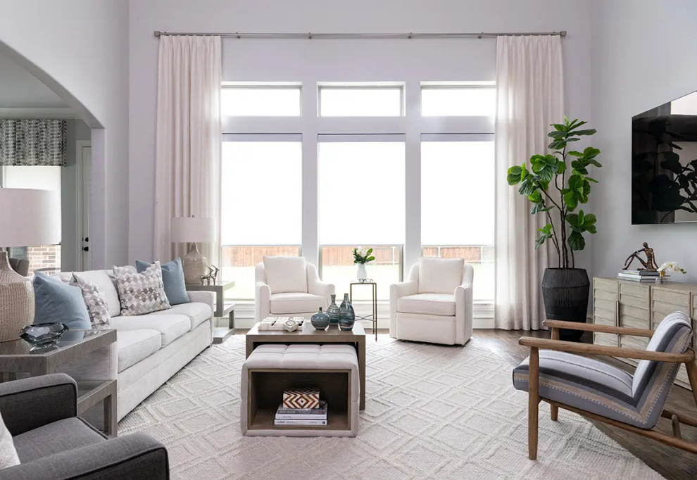 Transitional open concept dark wood floor and brown floor living room photo in Dallas with gray walls, no fireplace and a wall-mounted tv