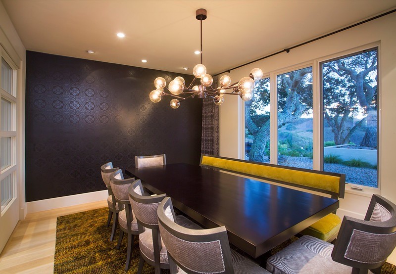 This is an example of a mid-sized contemporary separate dining room in San Francisco with white walls and light hardwood floors.