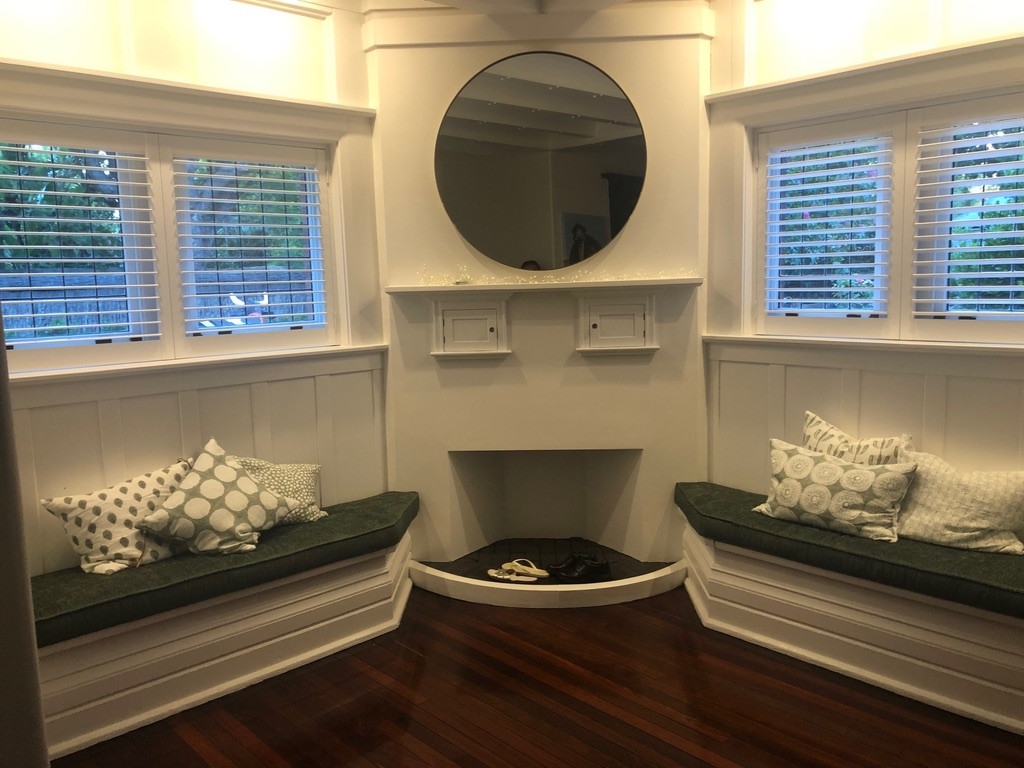 Entry Foyer - Featuring Custom Shutters and window seats