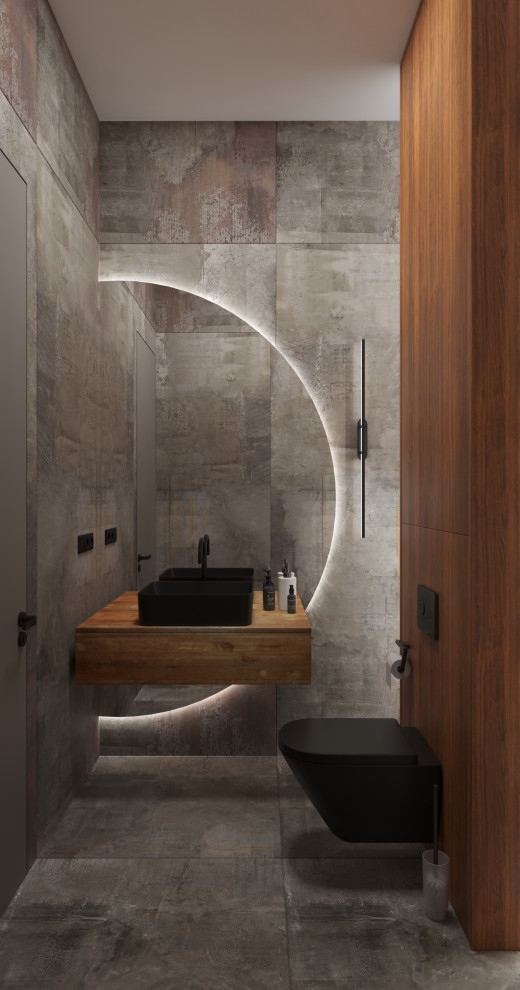 This is an example of a rustic cloakroom in Other with flat-panel cabinets, dark wood cabinets, a wall mounted toilet, grey tiles, porcelain tiles, grey walls, porcelain flooring, a built-in sink, solid surface worktops, grey floors and a floating vanity unit.