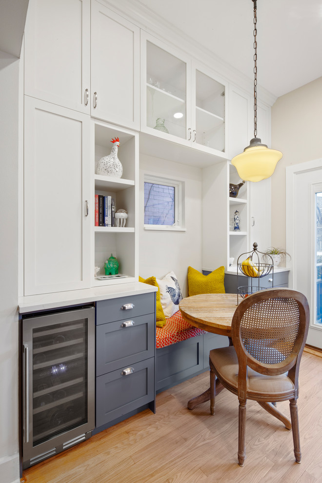 Inspiration for a small transitional light wood floor and beige floor kitchen/dining room combo remodel in Chicago with beige walls and no fireplace