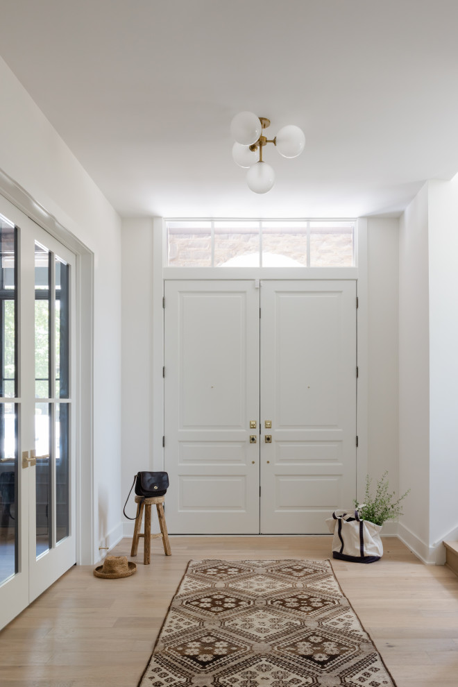 Inspiration for a transitional entryway remodel in Chicago