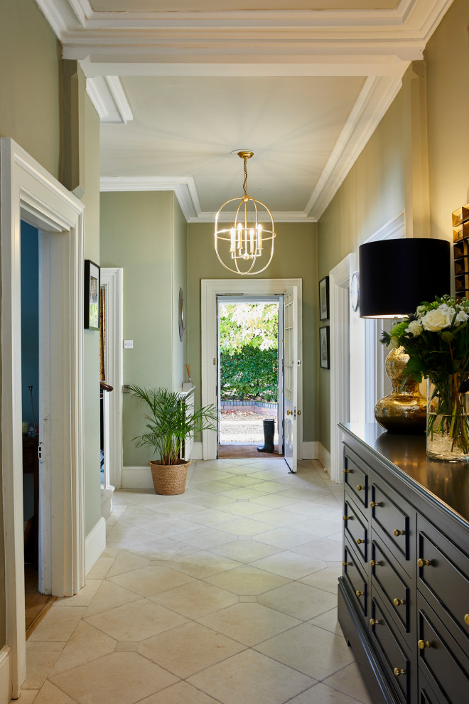 Inspiration for a large classic hallway in West Midlands with limestone flooring and beige floors.