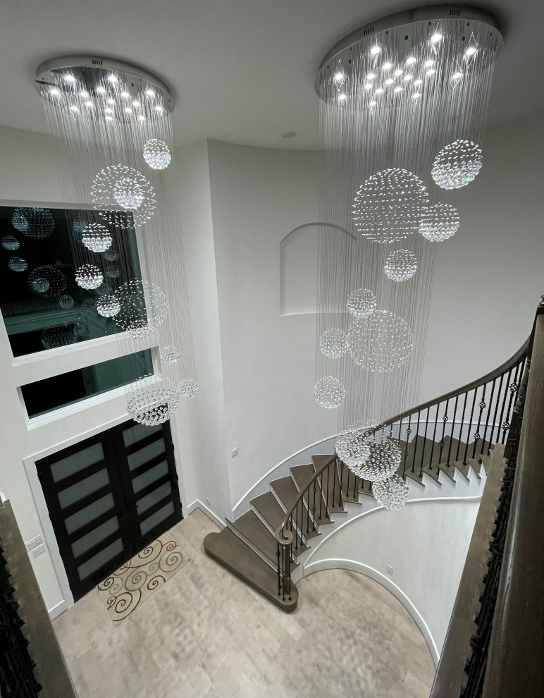 This is an example of a medium sized modern staircase in Houston.
