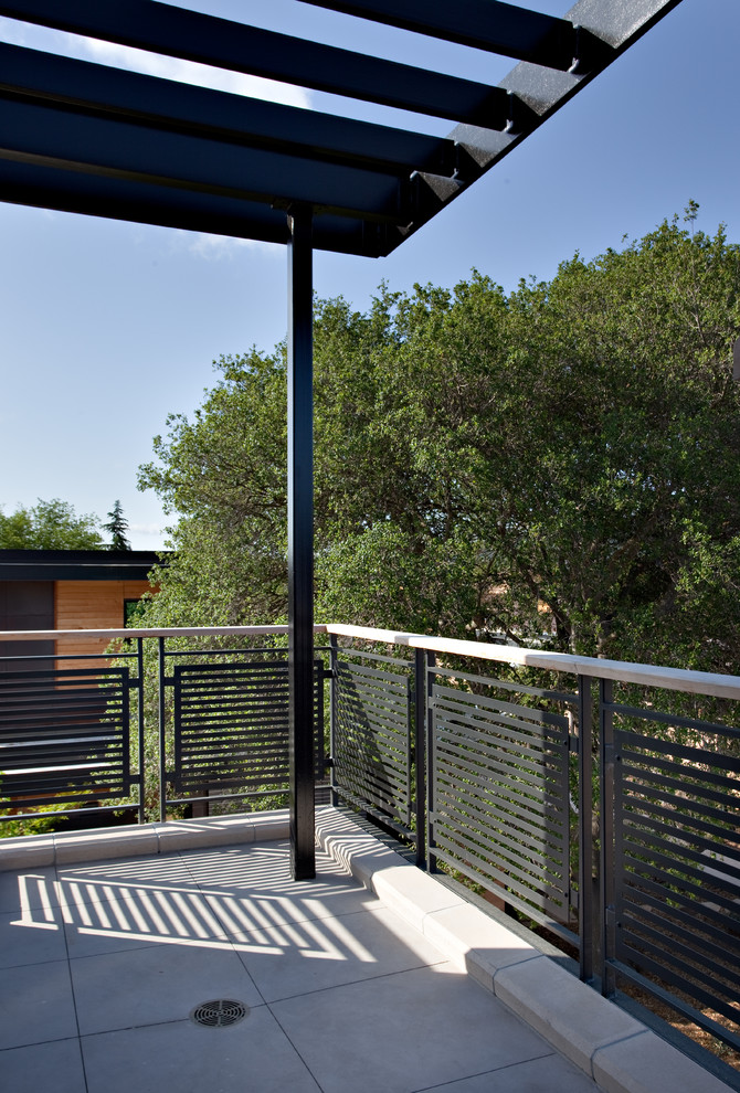 Deck - huge contemporary rooftop balcony deck idea in San Francisco with an awning