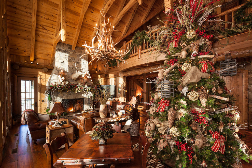 Living room - rustic formal and open concept brown floor living room idea in Atlanta with brown walls, a standard fireplace, a stone fireplace and no tv