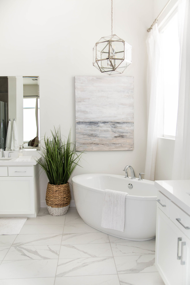 Bathroom - mid-sized transitional master white tile marble floor and white floor bathroom idea in Phoenix with shaker cabinets, white cabinets, solid surface countertops and white countertops