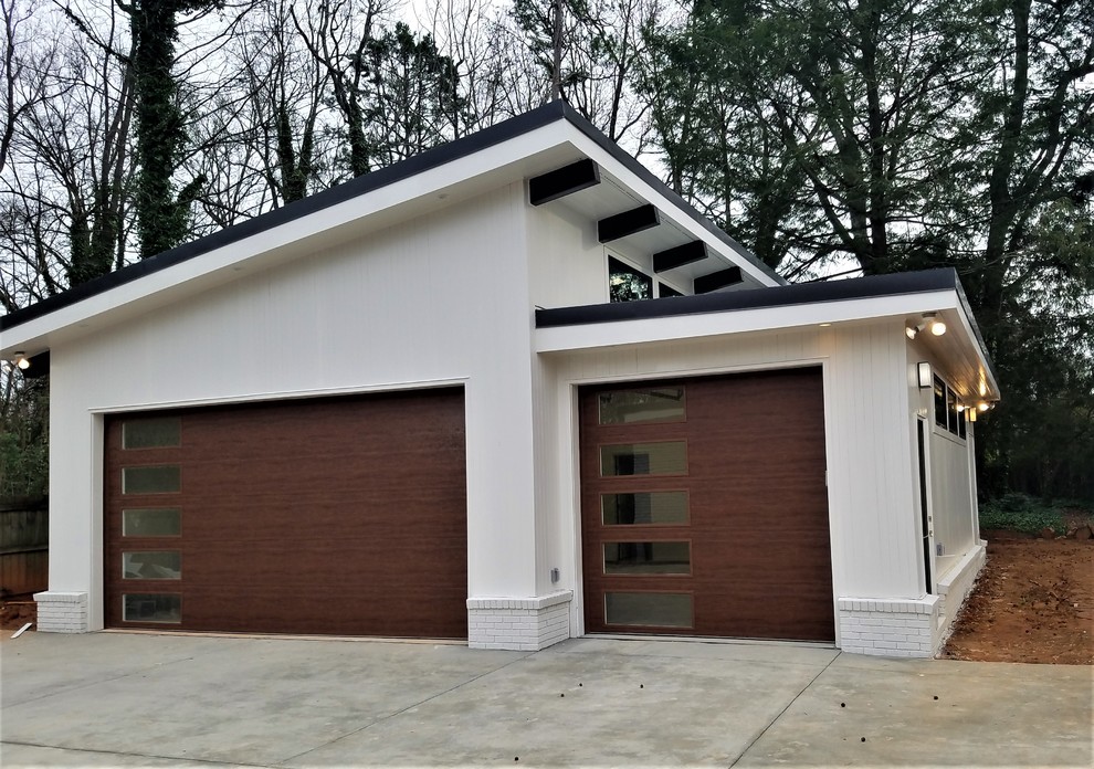 Photo of a large midcentury garage in Charlotte.