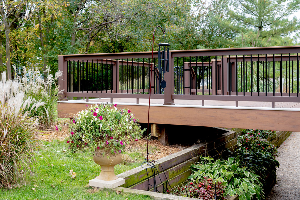 Deck - mid-sized transitional backyard deck idea with no cover