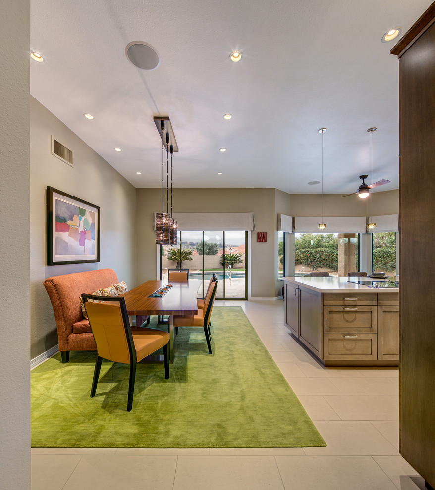 Large contemporary kitchen/dining combo in Phoenix with porcelain floors and beige walls.