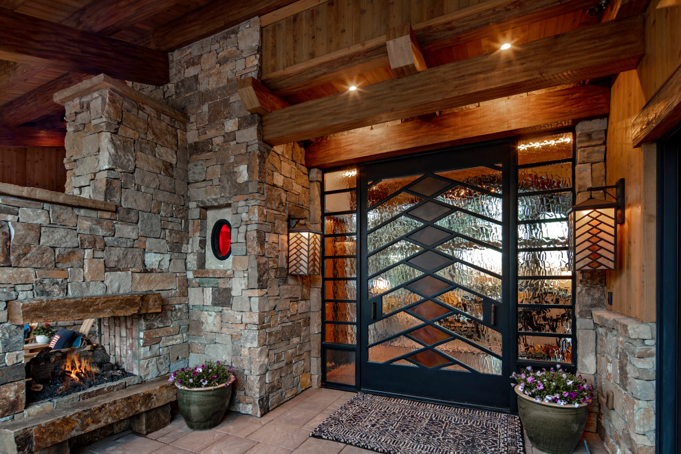 Front door - rustic front door idea in Phoenix with a glass front door