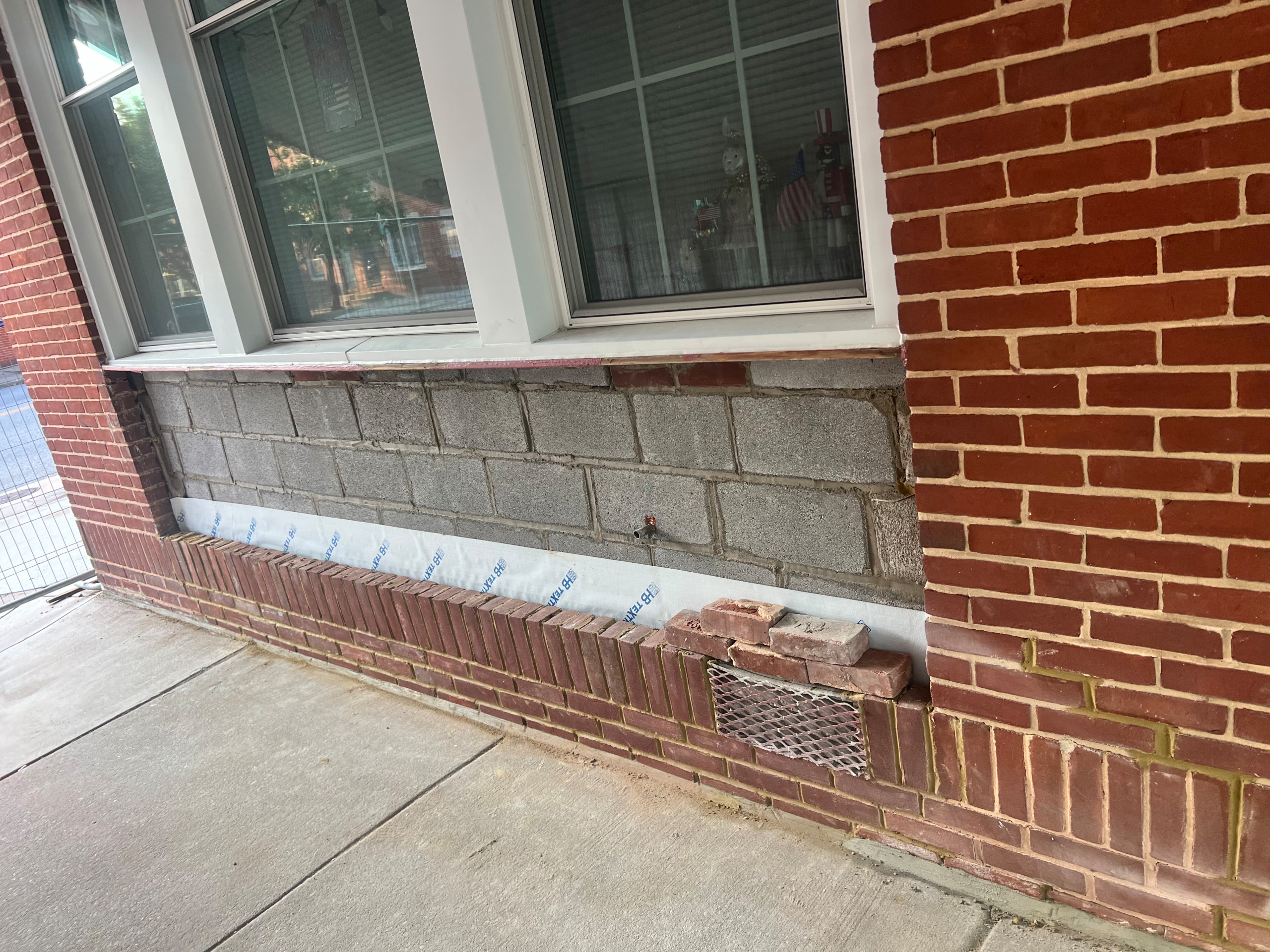 Historic wall panel and brick veneer replacement