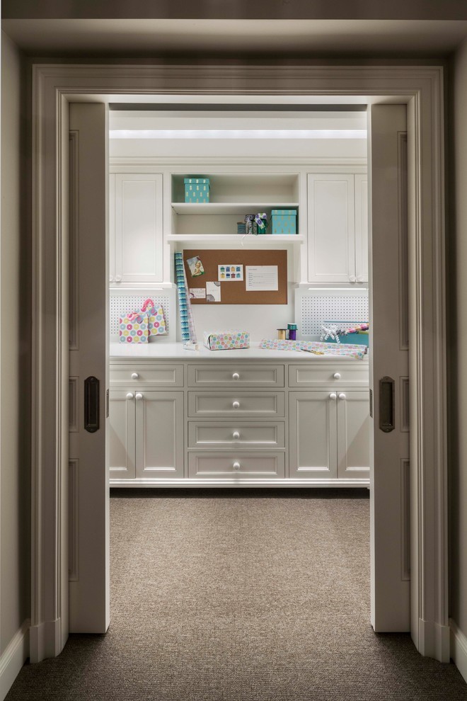 Inspiration for a small eclectic gray floor and carpeted hallway remodel in Other with white walls