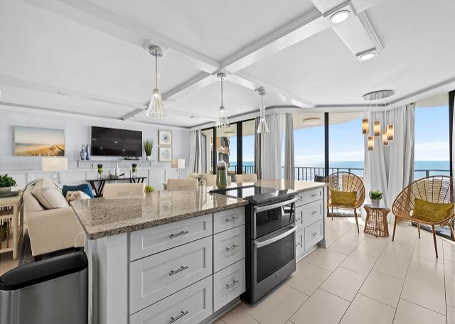 Maisons-sur-mer Myrtle Beach Condo Renovation kitchen and livingroom ocean view.