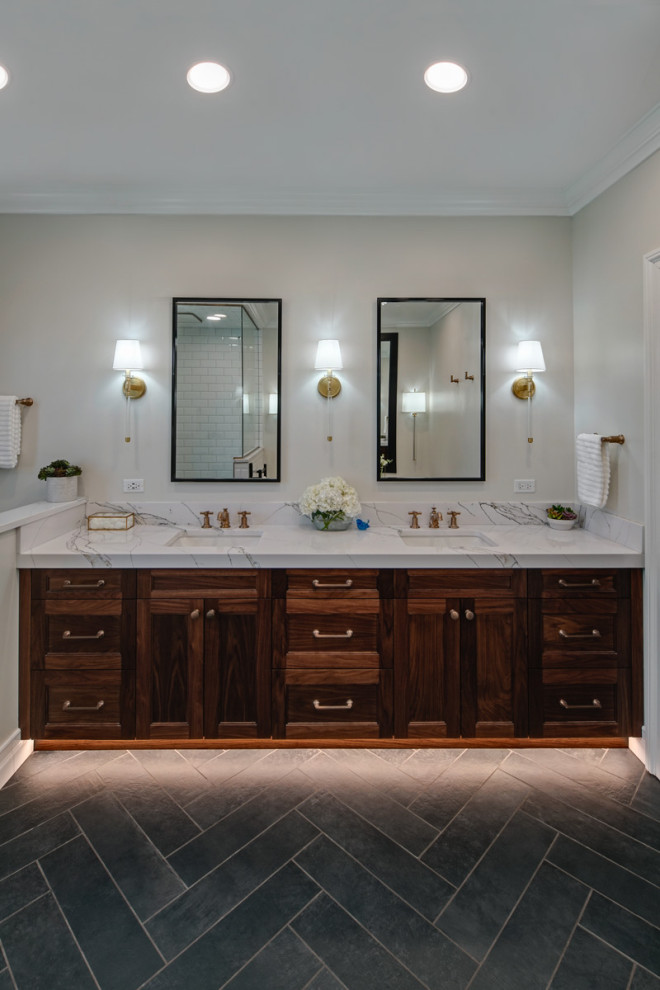 Inspiration for a large classic ensuite bathroom in Chicago with medium wood cabinets, a corner shower, ceramic flooring, a submerged sink, engineered stone worktops, black floors, a hinged door, grey worktops, a wall niche, double sinks and a freestanding vanity unit.