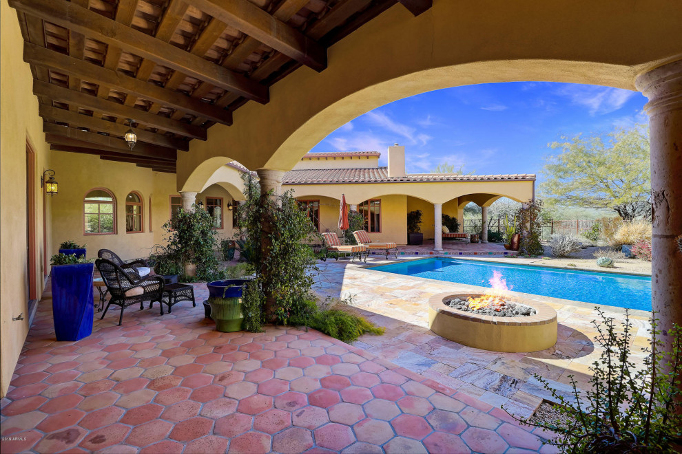 Inspiration for a large courtyard rectangular pool in Phoenix.
