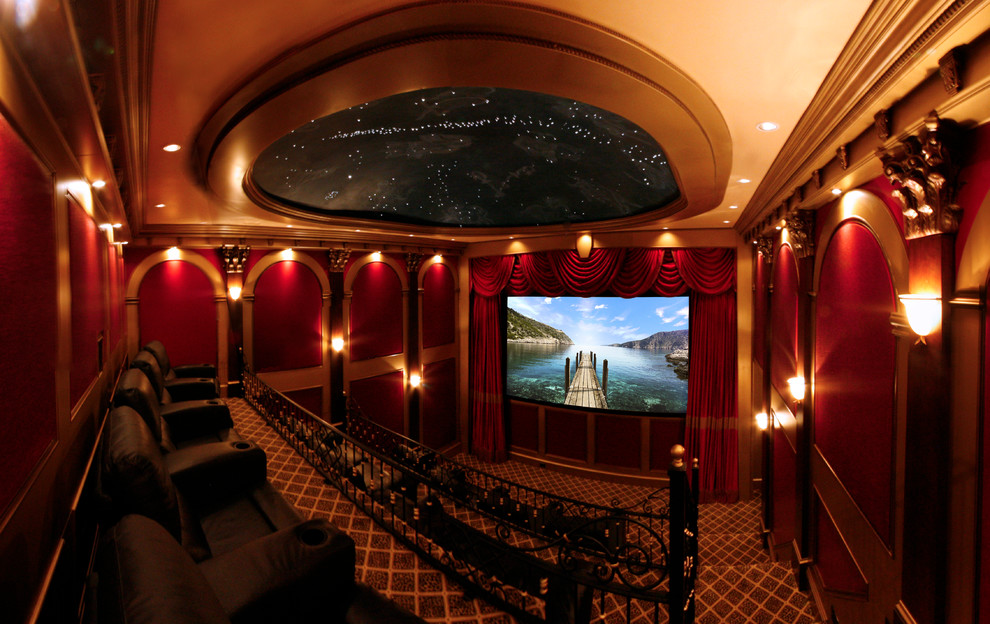 This is an example of a large traditional home theatre in Atlanta.