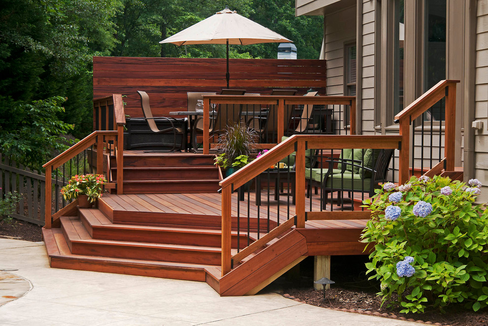 Photo of a mid-sized transitional backyard deck in Atlanta with no cover.