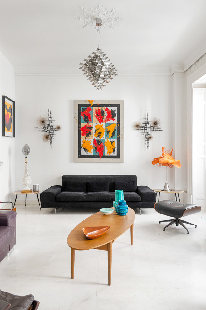 This is an example of a mid-sized contemporary open concept living room in Madrid with white walls, ceramic floors and white floor.