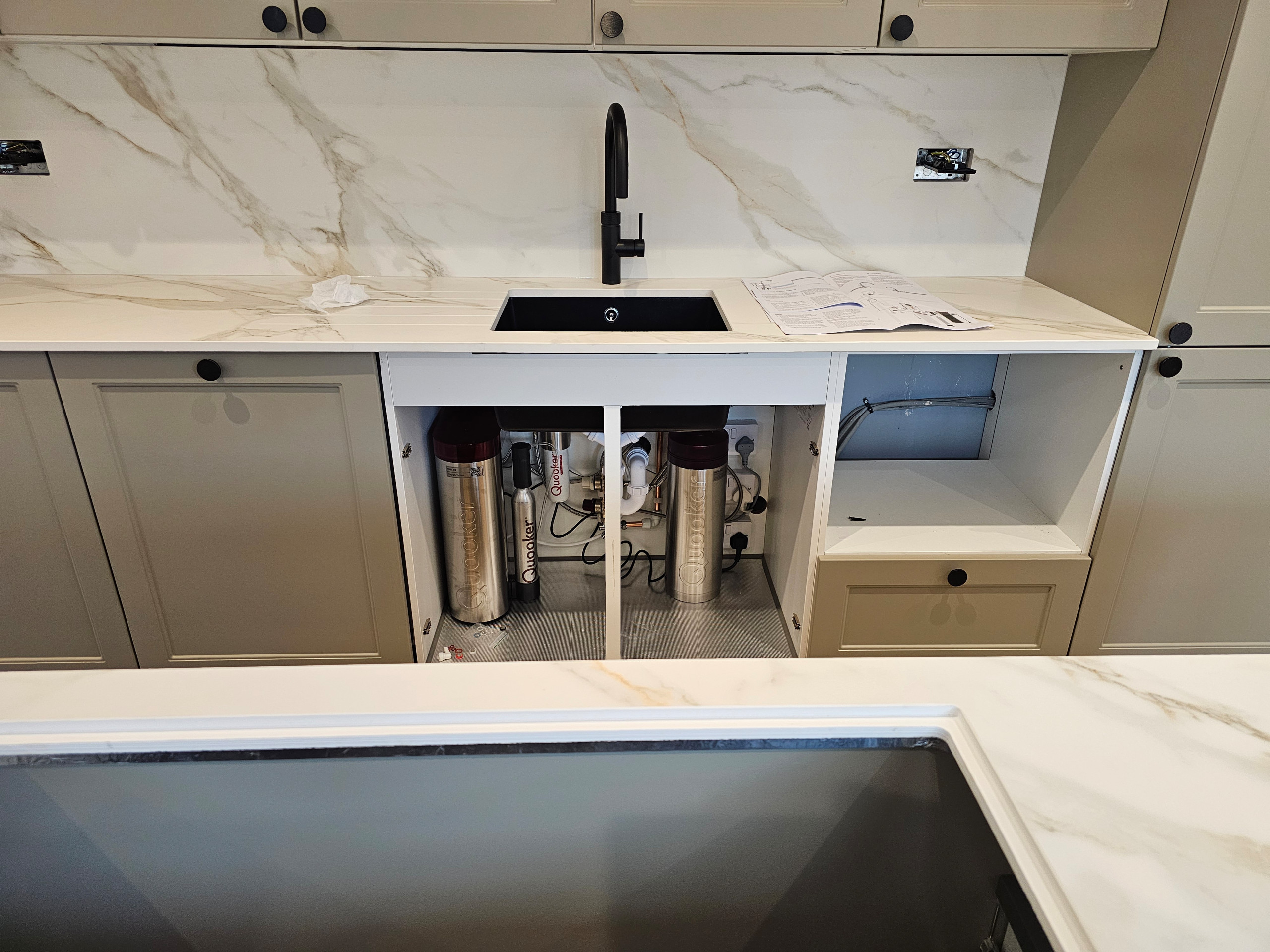 Full Quooker Cube boiling hot tap installation with filtered chilled, still and sparkling water on tap.