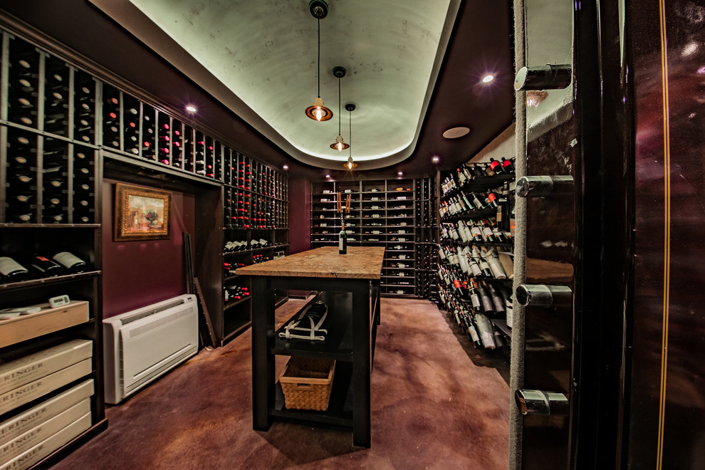 This is an example of an industrial wine cellar in Salt Lake City with storage racks and multi-coloured floor.