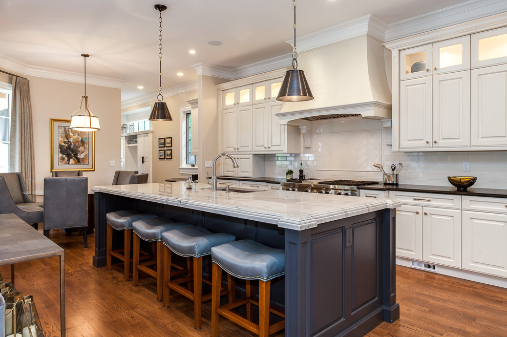 Example of a transitional kitchen design in Denver