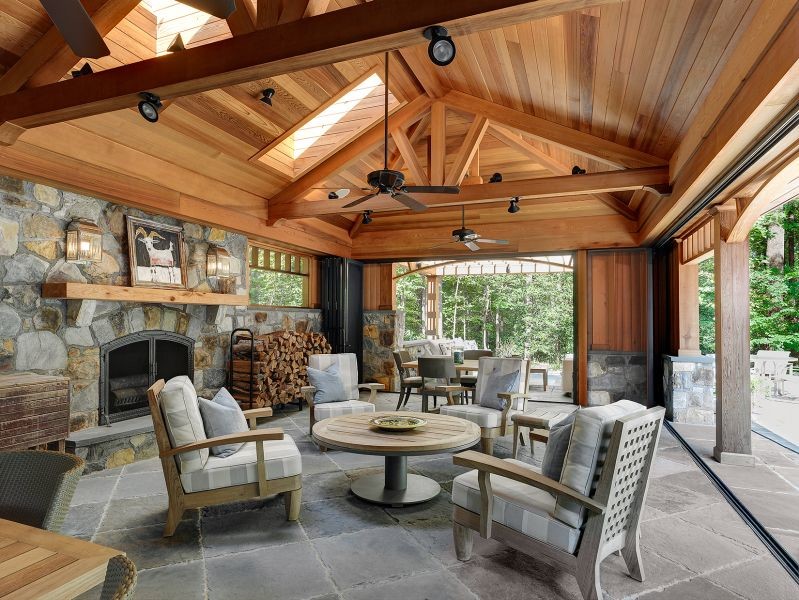 Patio - large transitional backyard patio idea in DC Metro with a fire pit and a pergola