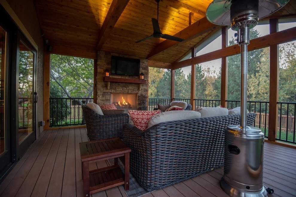 Inspiration for a mid-sized traditional backyard verandah in Kansas City.