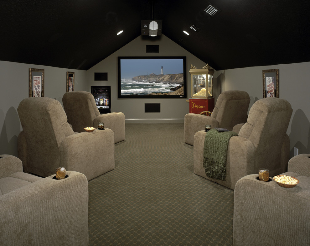 Inspiration for a mid-sized traditional enclosed home theatre in Jacksonville with grey walls, carpet, a projector screen and grey floor.