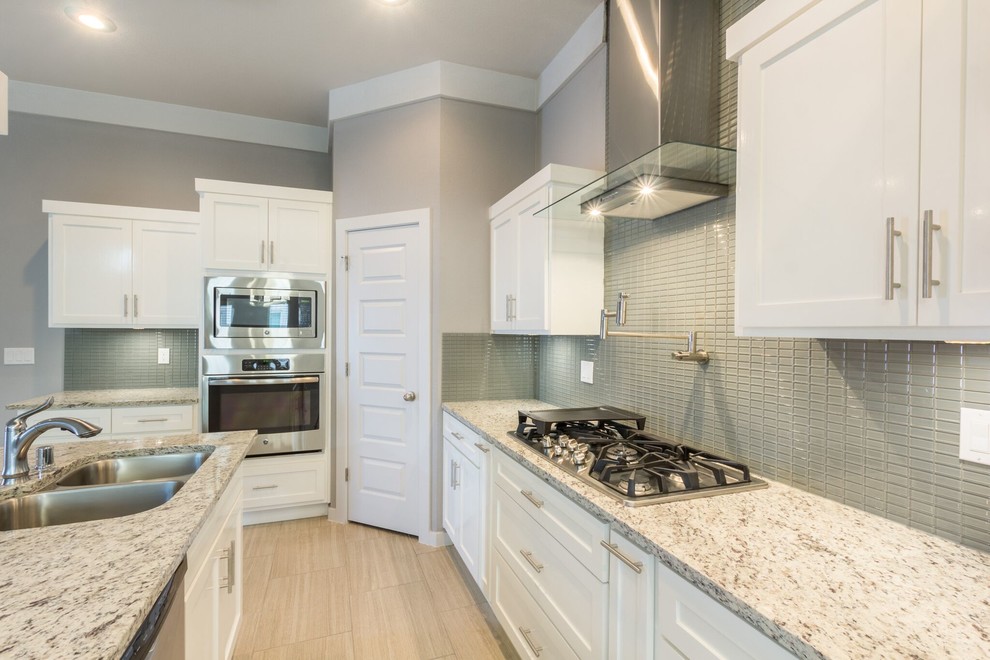 Example of a transitional kitchen design in Austin