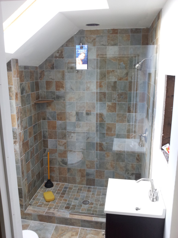 This is an example of an eclectic bathroom in Newark with an open shower.