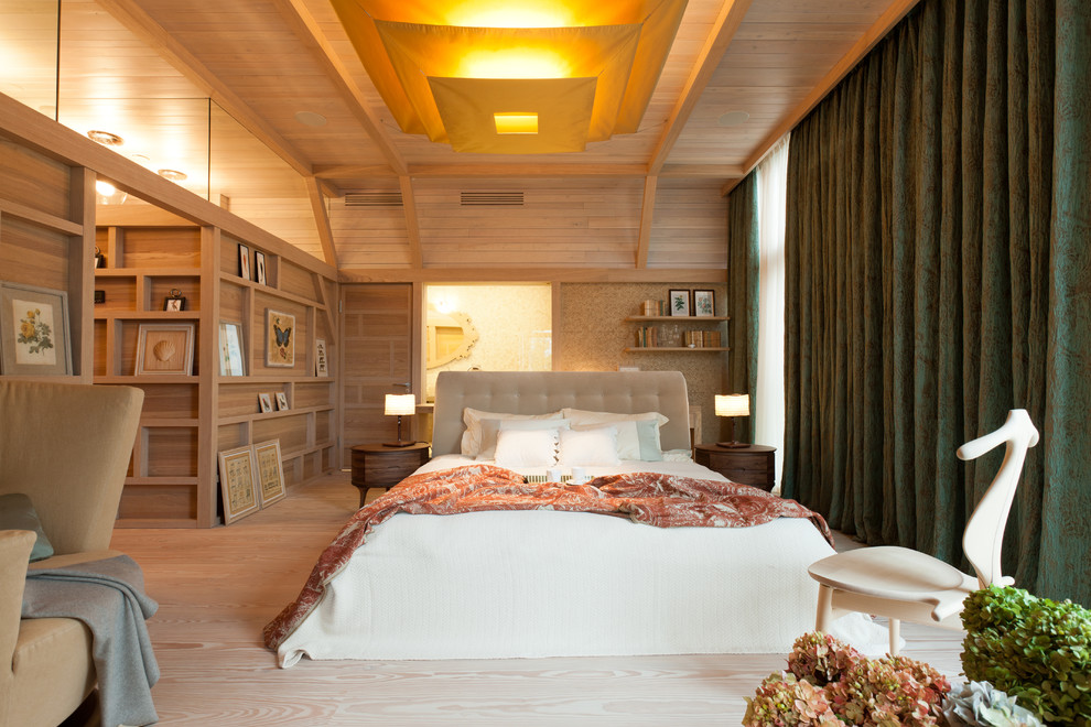 Inspiration for a contemporary master bedroom in Saint Petersburg with light hardwood floors.