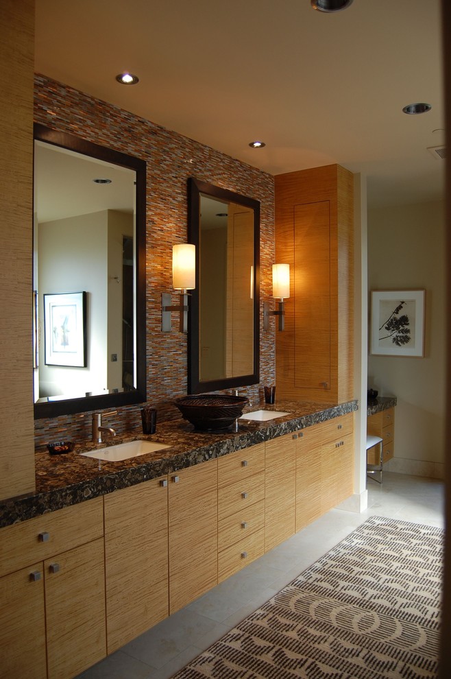 Photo of a large contemporary master bathroom in Seattle with flat-panel cabinets, light wood cabinets, beige walls, travertine floors, an undermount sink, granite benchtops, beige floor and black benchtops.