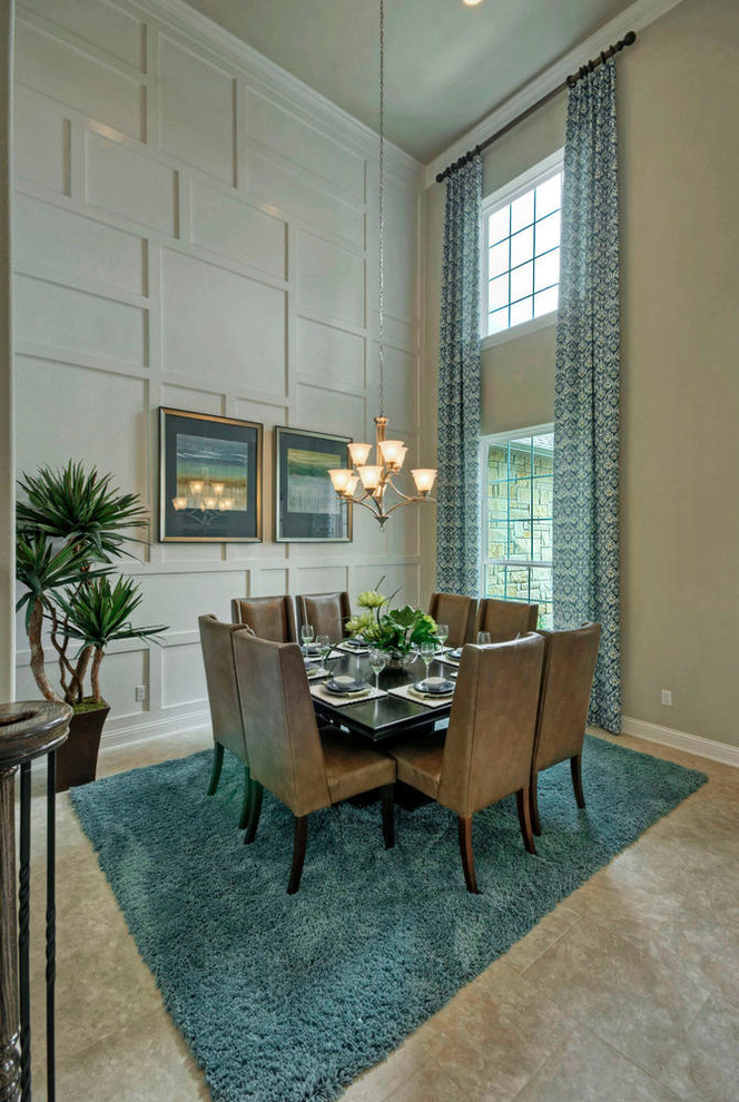 Photo of a large transitional dining room in Austin with white walls and ceramic floors.