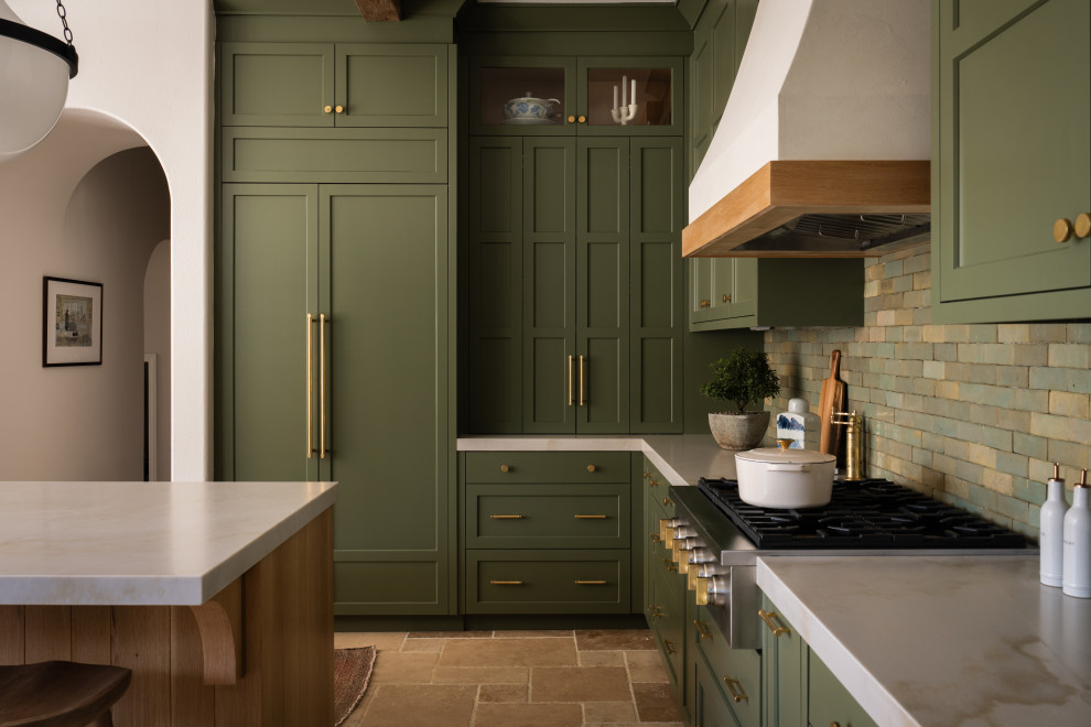 Inspiration for a transitional eat-in kitchen remodel in Orange County with recessed-panel cabinets, green cabinets, ceramic backsplash, stainless steel appliances and an island