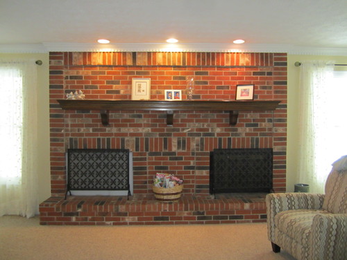 Need a change for a BIG red brick fireplace Here is my BIG red brick fireplace. It is 11 feet wide and goes floor to ceiling. There is only one fire box (right)