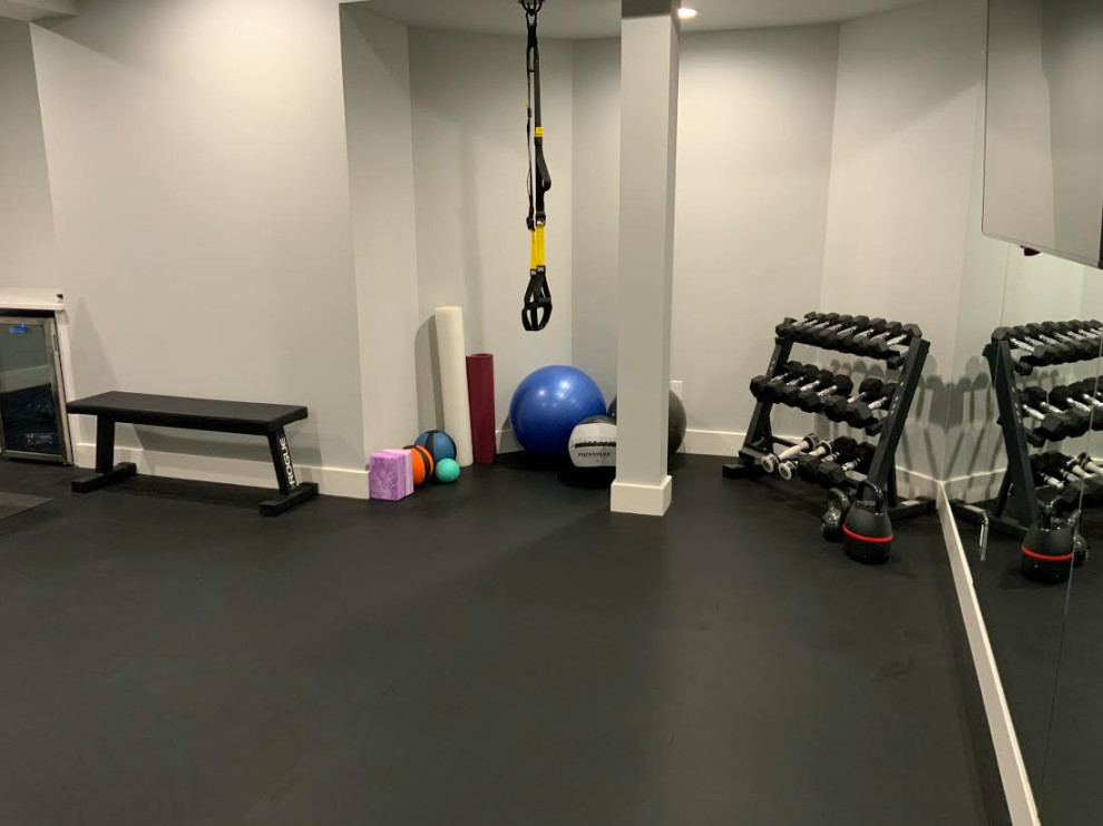 A Transitional Fun Family Basement with Bathroom, Gym, Movie Room and Gaming Ar
