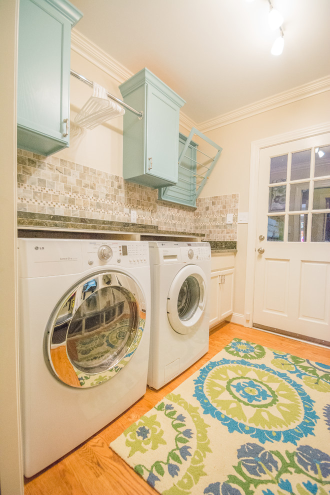 Design ideas for a contemporary laundry room in Raleigh.