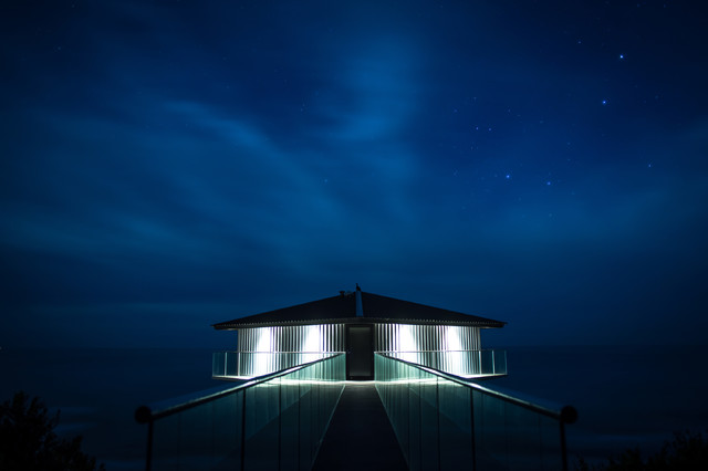 Pole House night sky coastal-patio